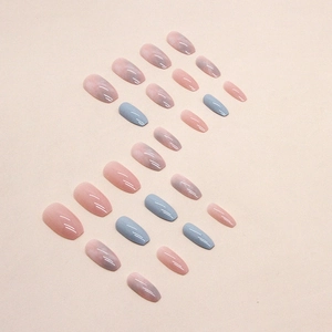 Short ballerina press-on nails with blue and pink marble jelly glaze design
