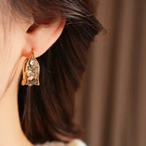 Vintage gold plated U-shaped wide earrings with shell inlay and zircon accents
