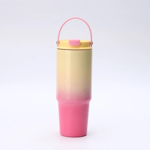 Detail of pink and yellow gradient 30oz stainless steel tumbler with handle and lid