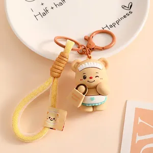 Cute cream bear keychain with apron and woven lanyard for handbags or car keys
