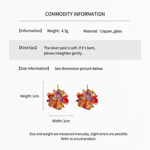 Macro detail of colorful glass flower stud earrings showing size dimensions and materials