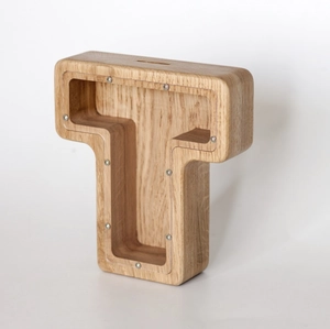Detail of a T-shaped oak wood money box with transparent acrylic cover for storage