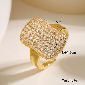 Macro shot of gold 18K plated geometric ring with cubic zirconia and size details