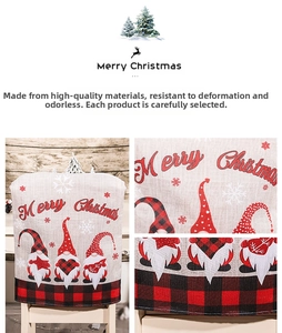 Close-up of burlap Christmas chair cover with gnomes and red black plaid borders