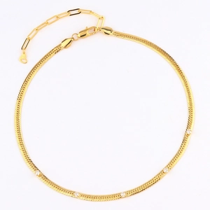Detail of 18k gold plated snake chain necklace featuring five sparkling cubic zirconia stones