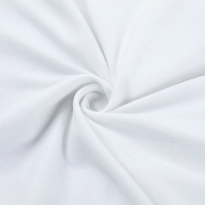 Macro shot of pure white knit fabric showing soft texture and spiral pleats detail