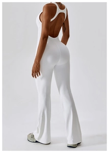 Rear view of white backless jumpsuit showing high-stretch fabric and flare pants fit