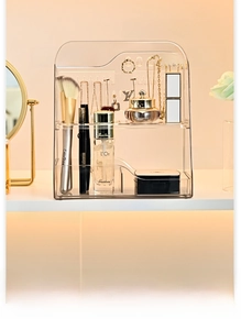Macro view of transparent PET organizer showing jewelry hooks and makeup storage tiers