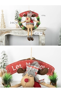 Detail of Christmas reindeer rattan wreath showing dimensions 45x34cm and Let it snow sign
