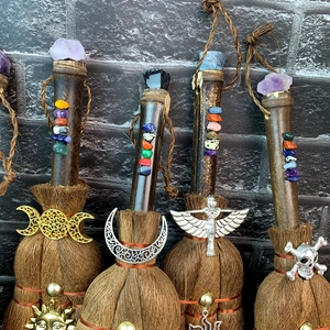 Brown witch broom with natural crystals, chakra stones and mystic metal charms