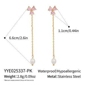 Detailed view of pink clover pearl tassel earrings with size and weight measurements