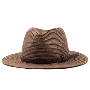 Brown woven straw cowboy fedora hat for sun protection with floral embossed leather band