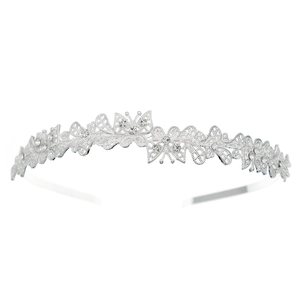 Sparkling silver rhinestone tiara with elegant hollow bowknot designs on a metal headband