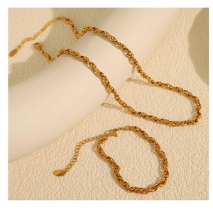 Detail shot of gold-plated stainless steel rope chain necklace and bracelet set