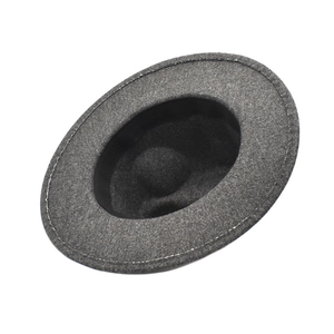 Top-down view of a dark grey wool fedora hat showing crown and brim details