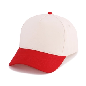 Detail of five-panel cotton baseball cap with cream crown and red brim construction