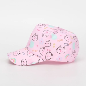 Detail of pink kids baseball cap featuring cute cartoon cat and rainbow prints