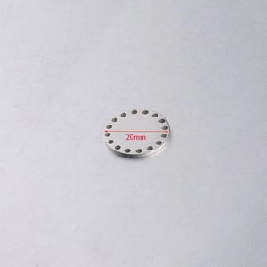 Detail view of 20mm mirror polished stainless steel round charm with perimeter holes