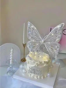 Luminous white lace butterfly cake topper set with glowing Queen and Happy Birthday sign