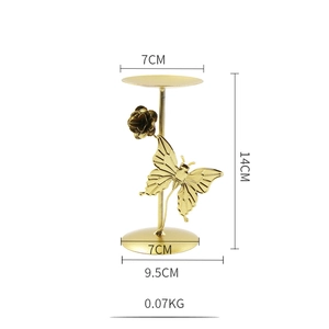 Detailed dimensions of the butterfly and flower golden iron candle holder showing 14cm height