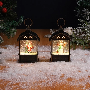 Retro Christmas water lantern with Santa and Snowman figures on a snowy wood surface