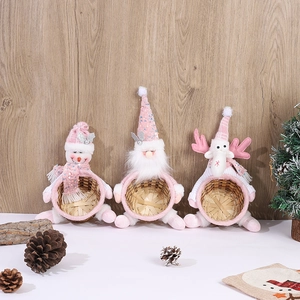 Pink and white Christmas storage baskets featuring snowman and deer holiday characters