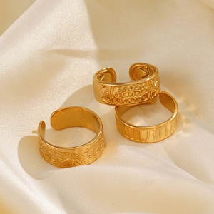 Three-piece set of gold adjustable stainless steel rings with vintage embossed eye patterns