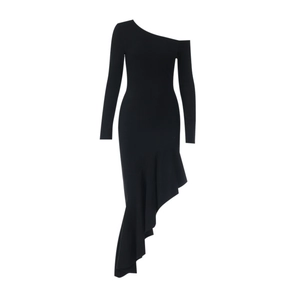 Close-up of the black one-shoulder dress showing tight knit fabric and asymmetric hem