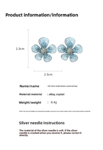 Detail view of blue crystal flower earrings with 925 silver needles and 2.3cm dimensions