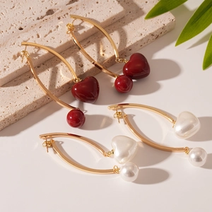 Retro resin heart and pearl cherry earrings in red and white with gold-tone hooks