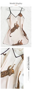 Detail of silk satin leopard print nightgown showing V-neck design and fabric texture