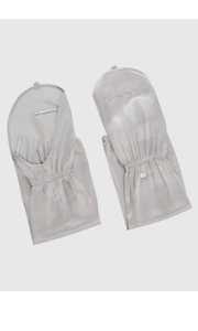 Detail of silver silk sun protection sleeves with elastic cuffs and decorative buttons