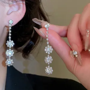 Elegant tiered cubic zirconia flower tassel drop earrings for women with silver plating