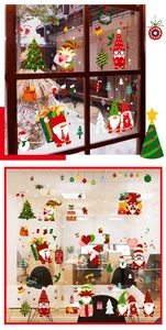 Close-up of Merry Christmas gnome window decals with festive glitter patterns for glass