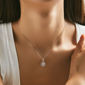 Classic S925 sterling silver halo necklace with a brilliant round moissanite pendant