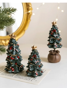 Miniature Christmas resin tree figurines with ornaments and rustic burlap base decorations