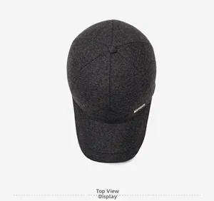 Top view of dark grey herringbone baseball cap with premium texture and metal logo