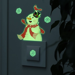 Glow-in-the-dark snowman wall decal set with snowflakes for Christmas light switch decor