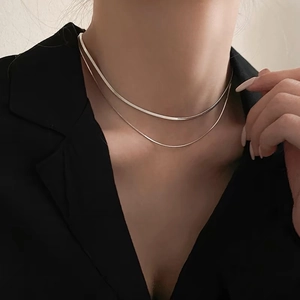 Double-layered titanium steel snake chain necklace in silver finish for a layered look