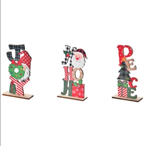 Wooden Christmas table ornaments with JOY, HO HO HO and PEACE letters and gnome motifs