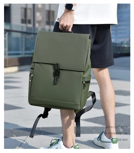 Detail of dark green waterproof leather backpack showing side zipper and buckle closure