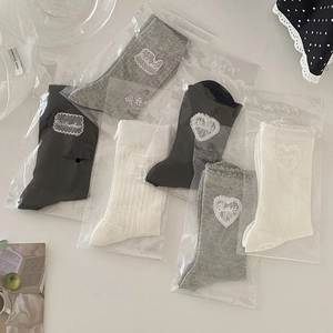 Three pairs of heart embroidery mesh socks in grey, black and white colors