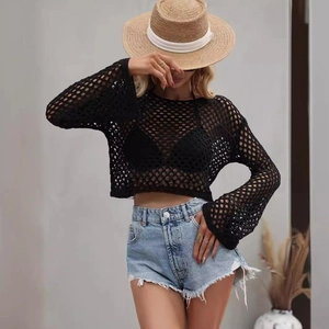 Women's black hollow crochet knit sweater with flare sleeves for beach vacation
