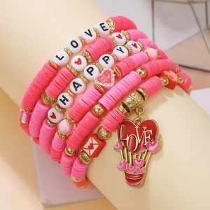 Pink multi-layer beaded bracelet set with LOVE and HAPPY letter beads and heart charms