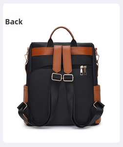 Rear view of waterproof backpack featuring a hidden anti-theft zipper pocket and brown trim