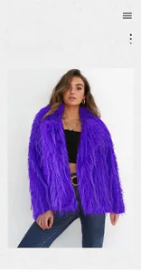 Detail shot of purple faux fur jacket with long fringe texture and vibrant violet finish