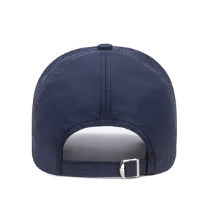 Rear view of a dark blue quick-dry sports baseball cap with laser-cut breathability holes