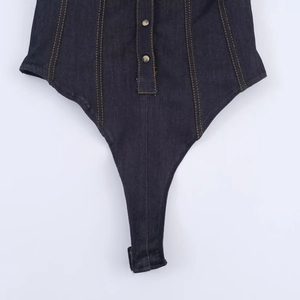 Slim fit dark blue denim bodysuit with brass buttons and yellow double stitching