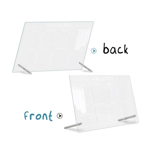 Detail view of transparent acrylic weekly to-do list board with silver metal stands