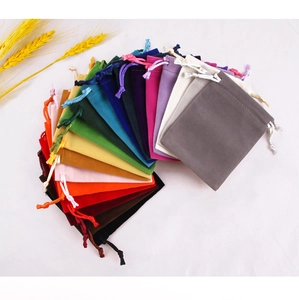 Detailed collection of colorful velvet drawstring pouches for jewelry and gift packaging